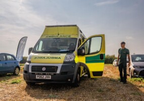 An AMG Ambulance arriving on scene